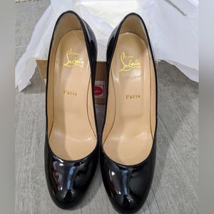 Christian Louboutin size 38 black patent leather heels. Worn twice